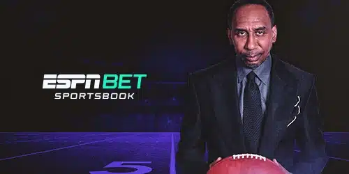 ESPN Sportsbook desktop banner showing man in suit against a black and purple background